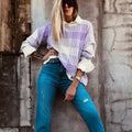 Lilac plaid print loose fit sweater with long sleeves and ribbed trim.