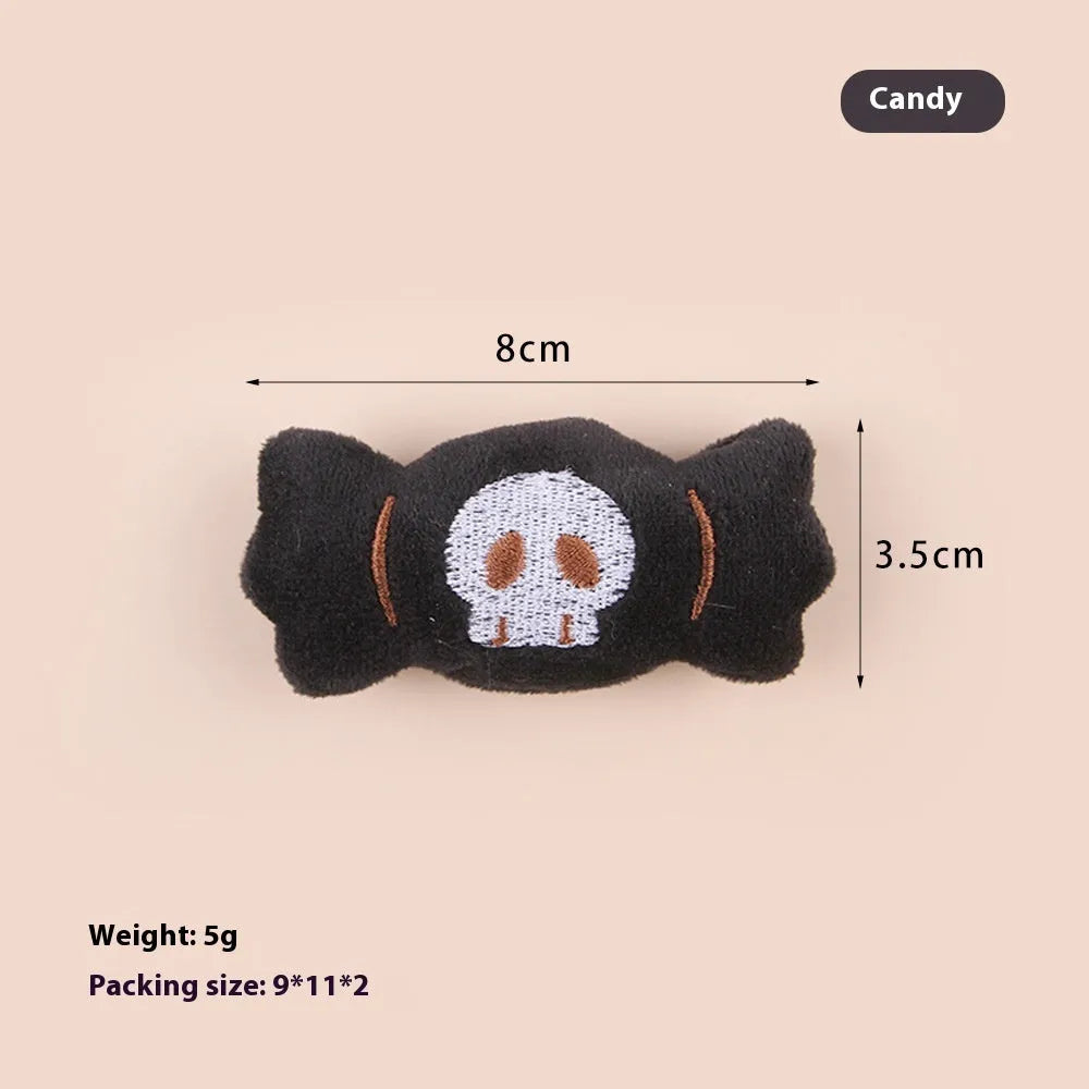 Small plush cat teaser toy with wand and colourful attachments for feline play