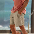 Men's straight leg beach shorts with drawstring elastic waistband and a heat transfer patch design.