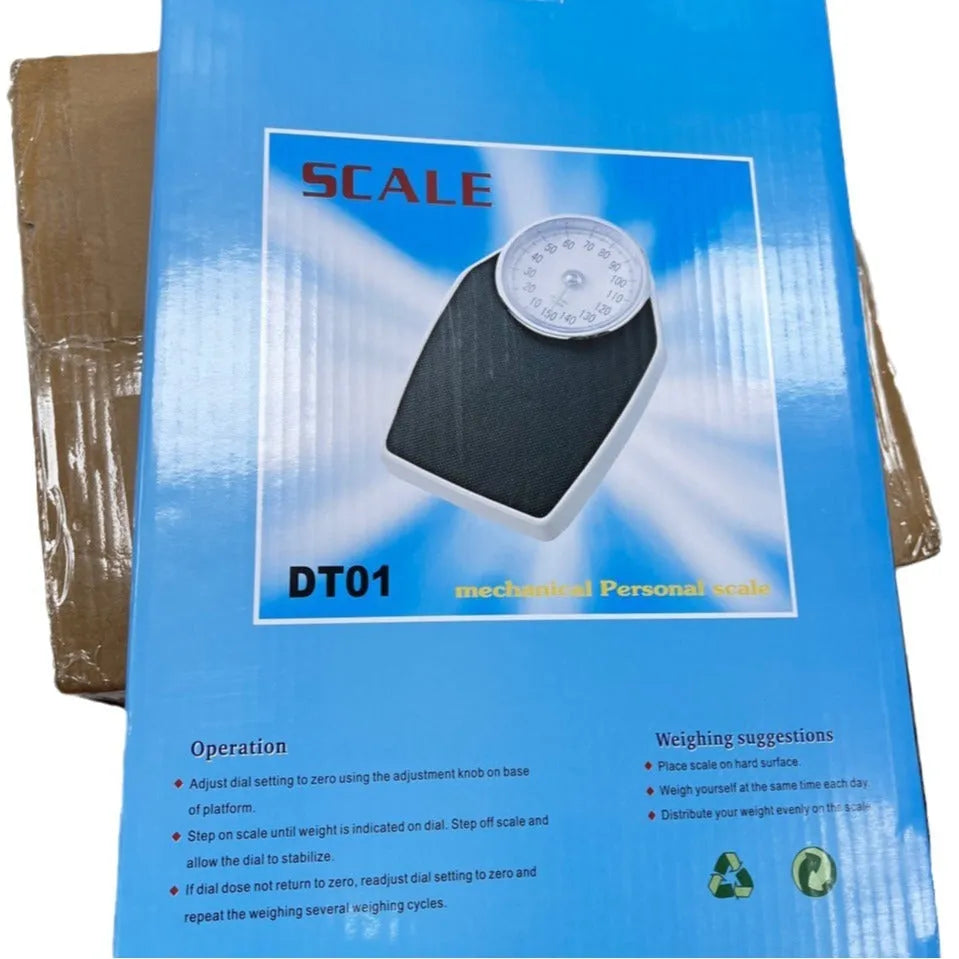 Black mechanical body weight scale with large dial showing weight measurements