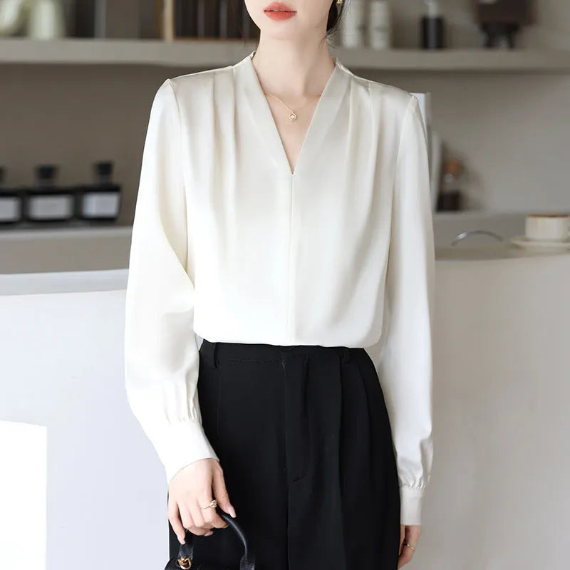 Solid colour women's long sleeve satin shirt with 3D stitching in blue and apricot