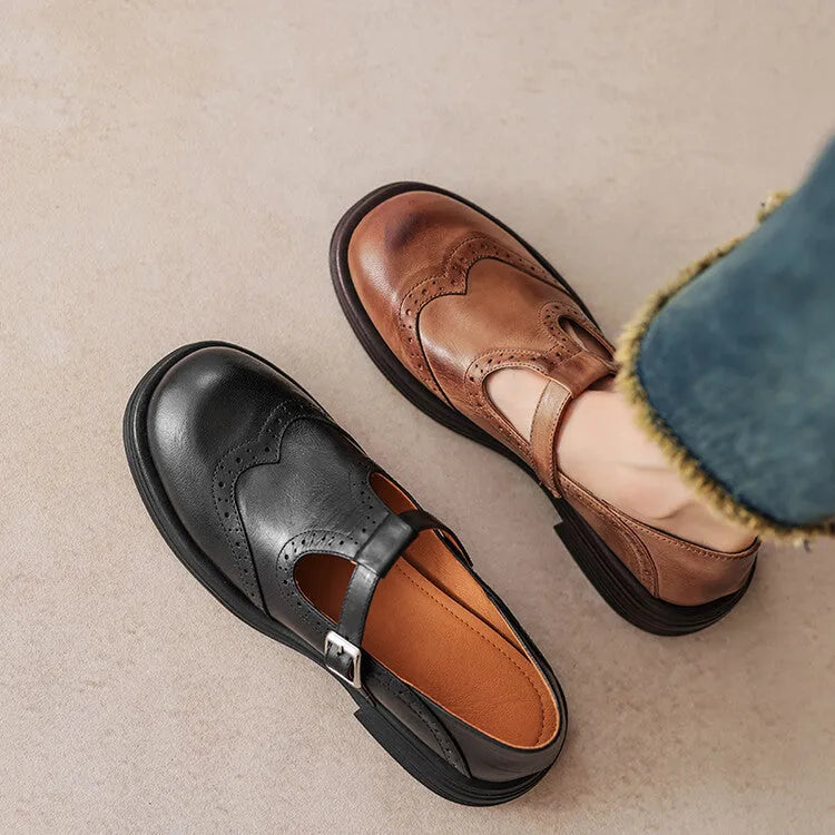 Women's flat British style sheepskin shoes in black with round toe and solid colour finish