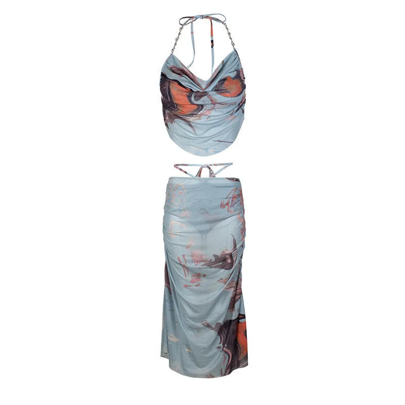 Blue women's three-piece bikini set with diamond chain split detailing and backless design