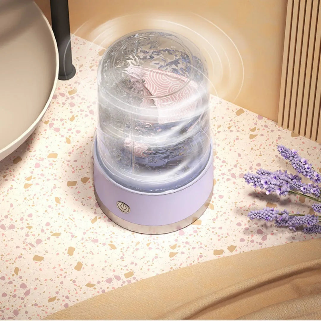 Portable USB rechargeable underwear washing machine in green colour showing laundry cup with mechanical switch