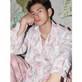 Blue floral long sleeve shirt with three-dimensional embossed pattern and loose fit design