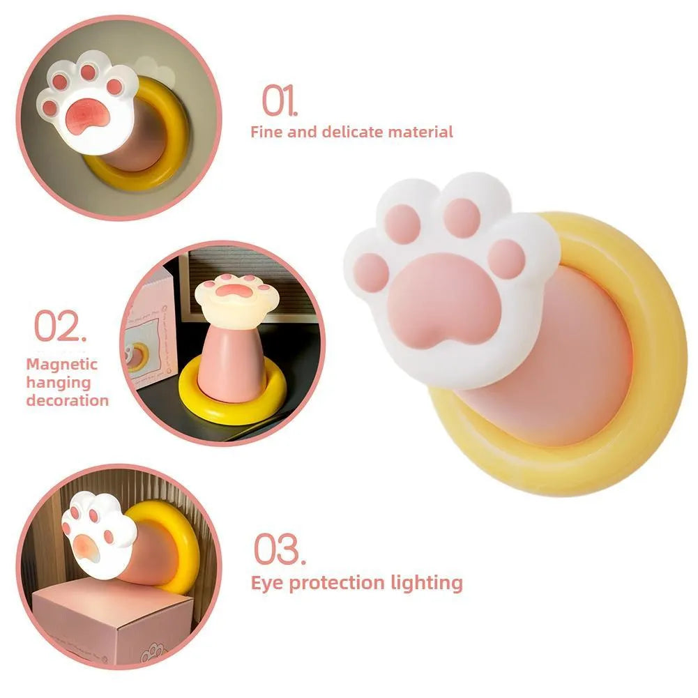 Cat paw rechargeable tap lamp with three brightness levels on a nightstand