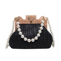 Women's woven straw shoulder bag with pearl chain detailing and multiple interior compartments