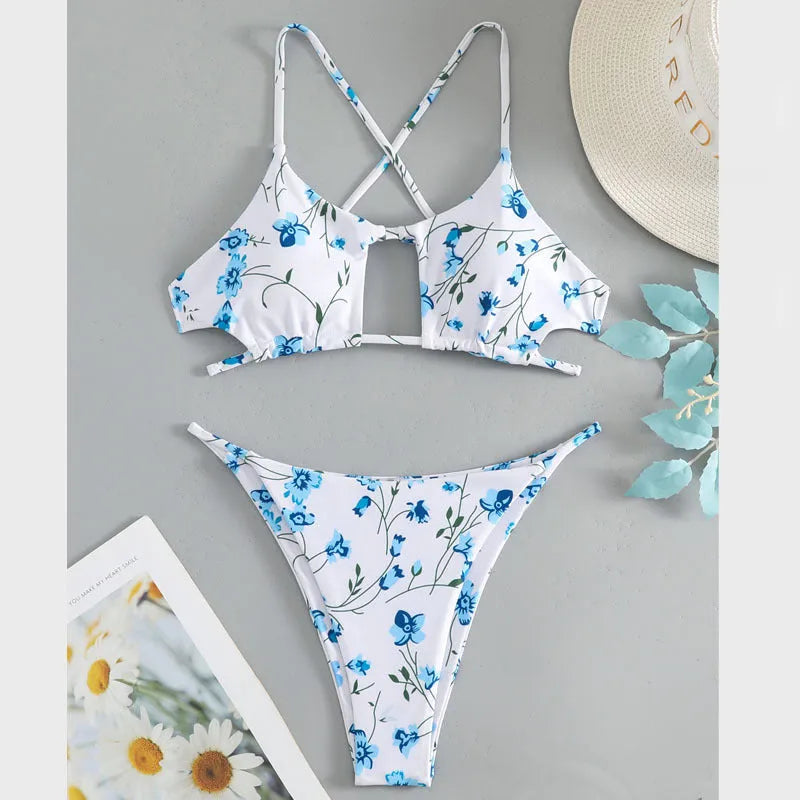 Women's floral tie-neck triangle swimsuit set with polyester lining and matching shorts in multiple colours sizes XS to XL.