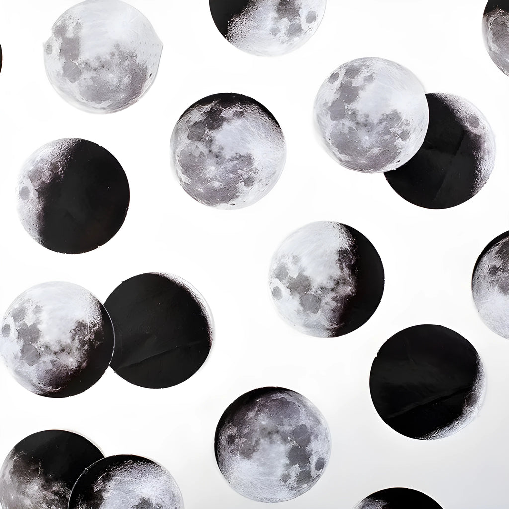 Box of 45 black moon phases and calendar planet stickers on self-adhesive paper