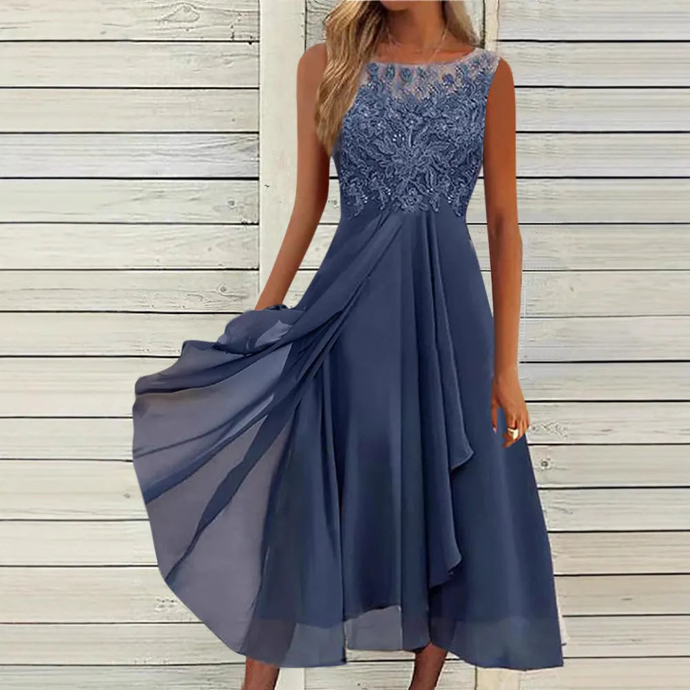 Women's sleeveless green chiffon dress with lace detailing and a mid-length skirt.
