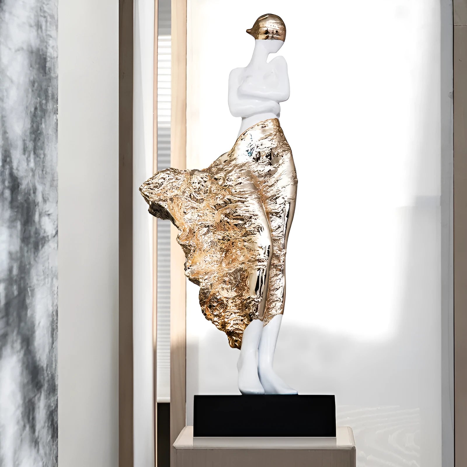 48cm tall sculptured character ornament in rose gold or silver finish with modern design