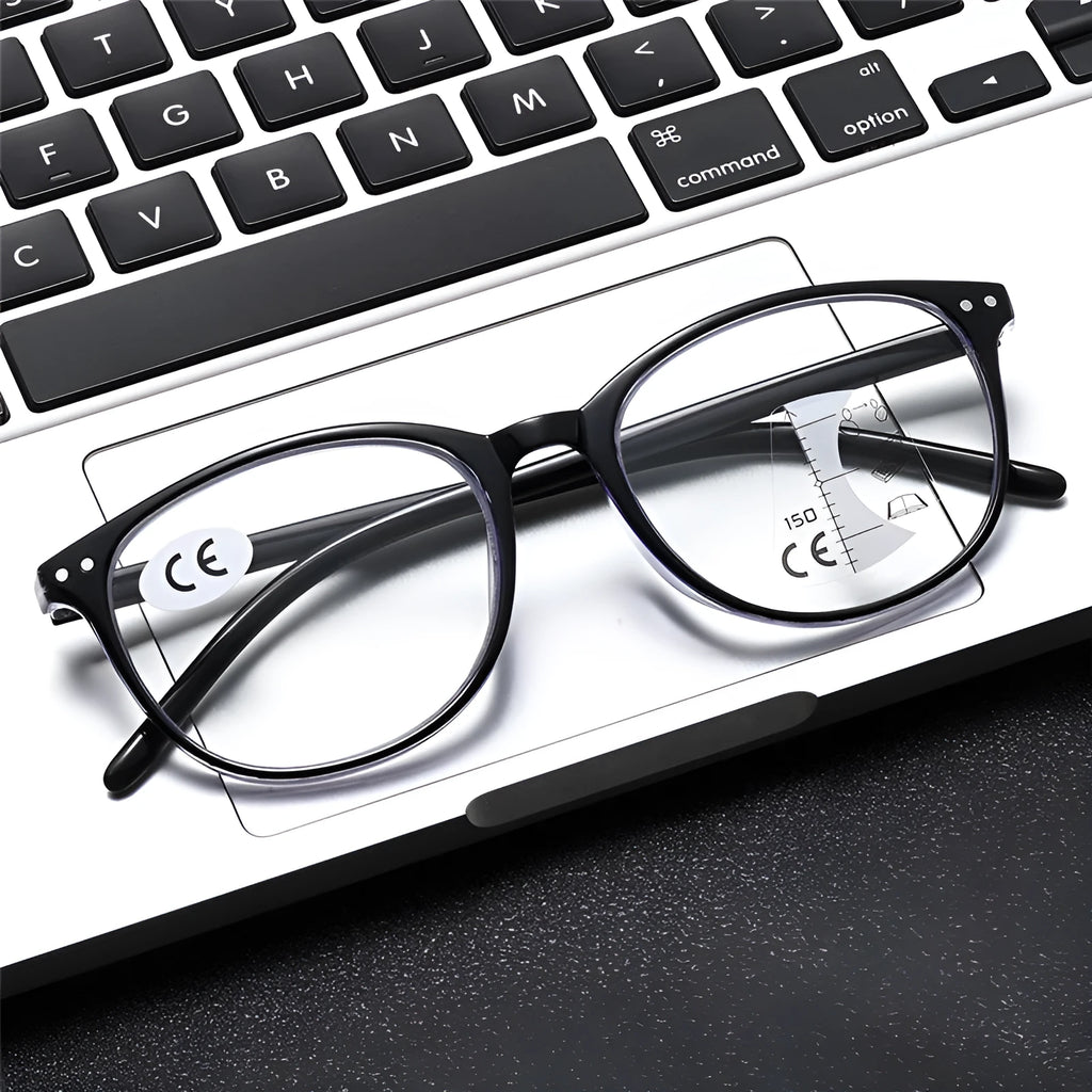Women's multi-focus presbyopic glasses with ultra-light frame in various colour options on a table.