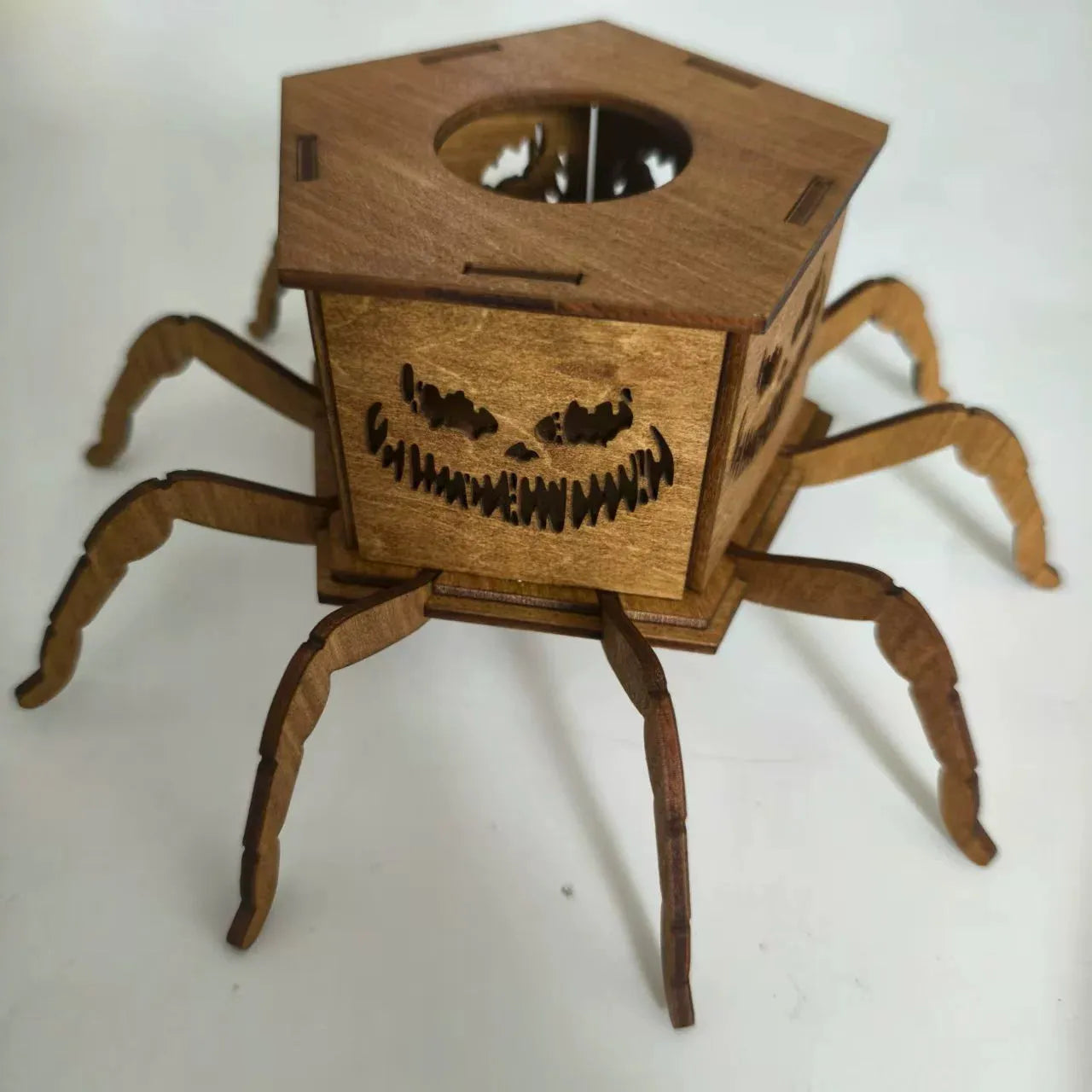 Wooden Halloween spider-themed mini lantern candlestick decoration measuring 21cm by 8.5cm.