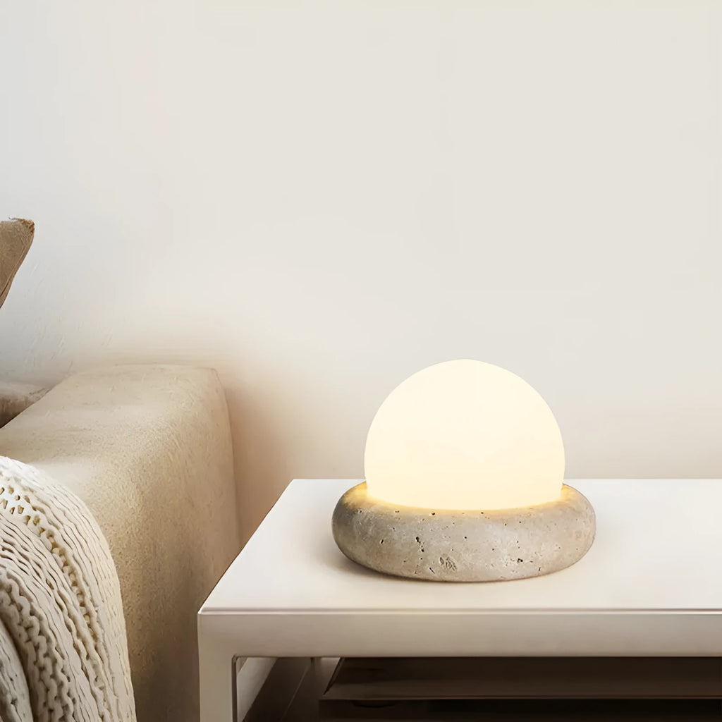 Cream modern bedside night lamp with remote control on wooden nightstand
