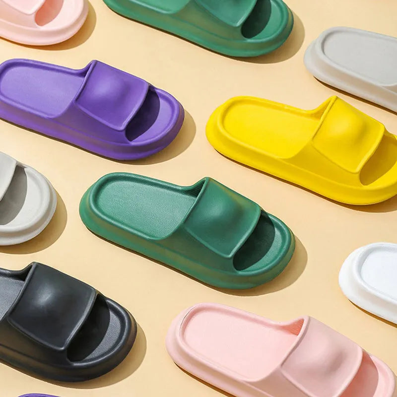 EVA flip-flop slippers with thick non-slip sole in various colours on a white background.