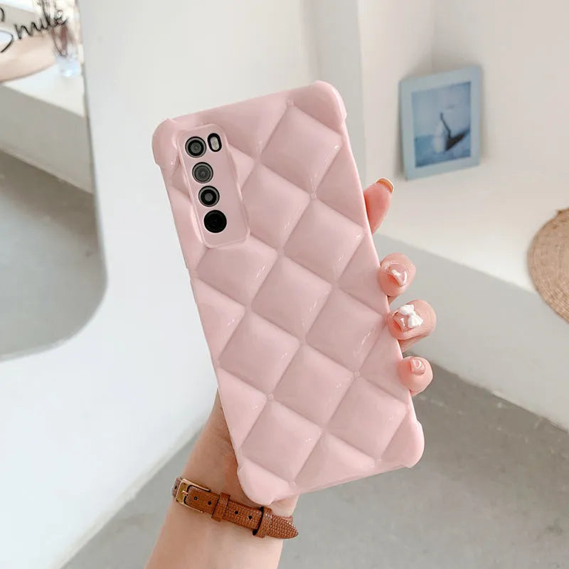 Black silicone diamond pattern phone case for a Huawei smartphone on a white background.