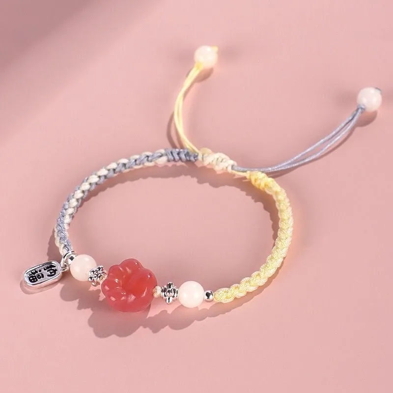 Handmade glass and coloured glaze cat's paw woven bracelet for couples in red, pink, or yellow
