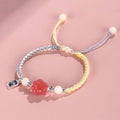 Handmade glass and coloured glaze cat's paw woven bracelet for couples in red, pink, or yellow
