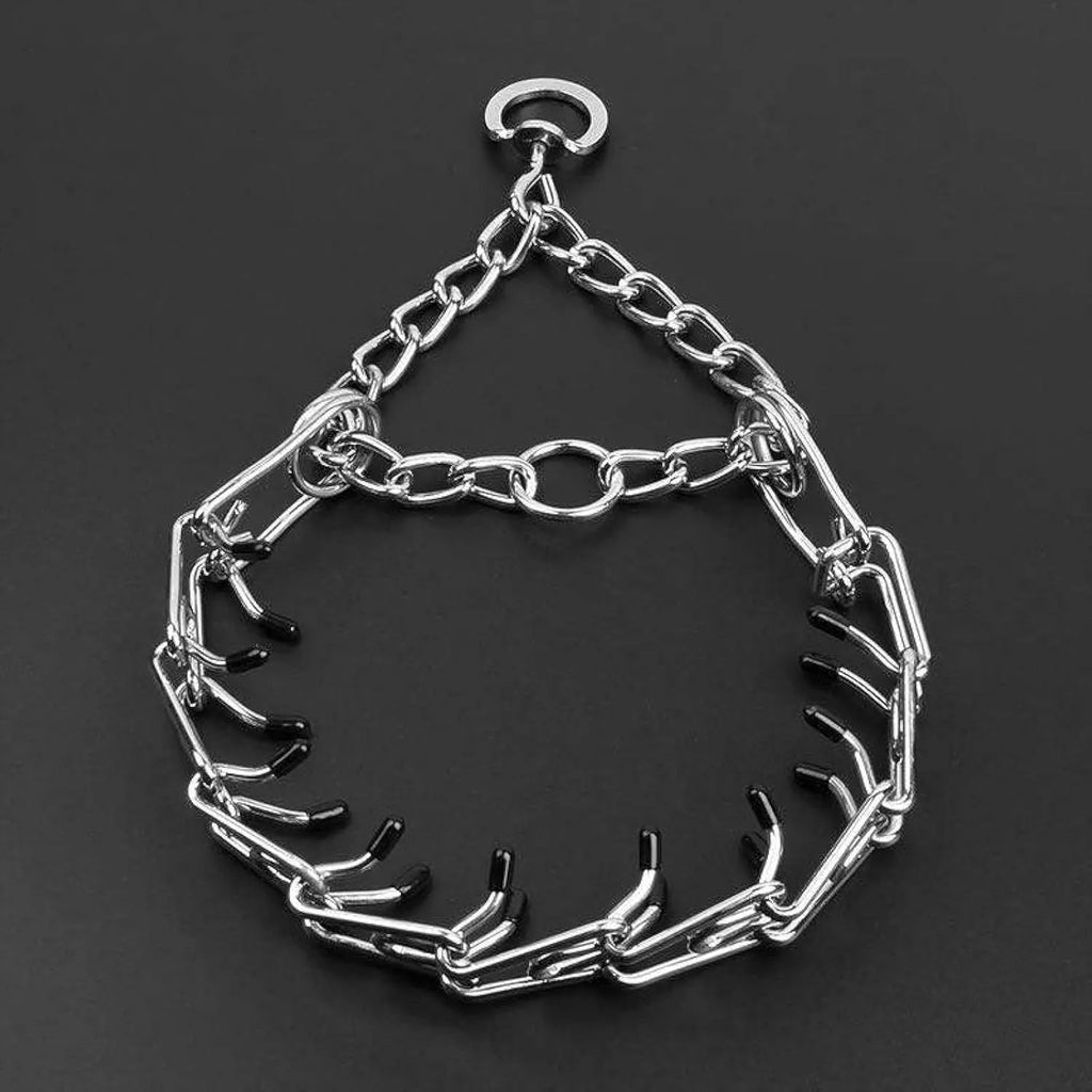 Stainless steel adjustable dog prong training collar with rubber comfort tips on a link.