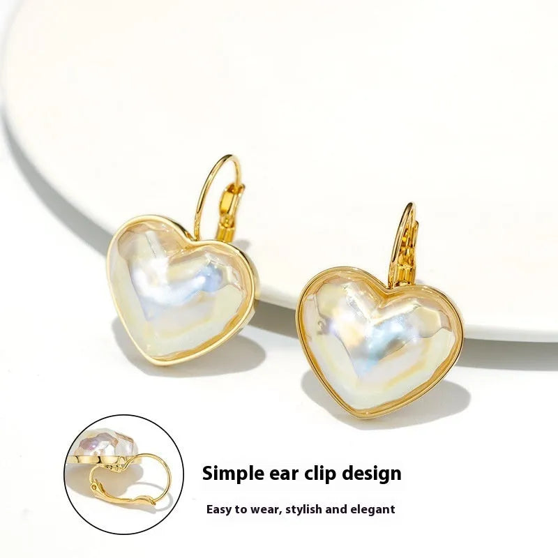 Gold coloured alloy ear clips for women with natural style and ear clip design