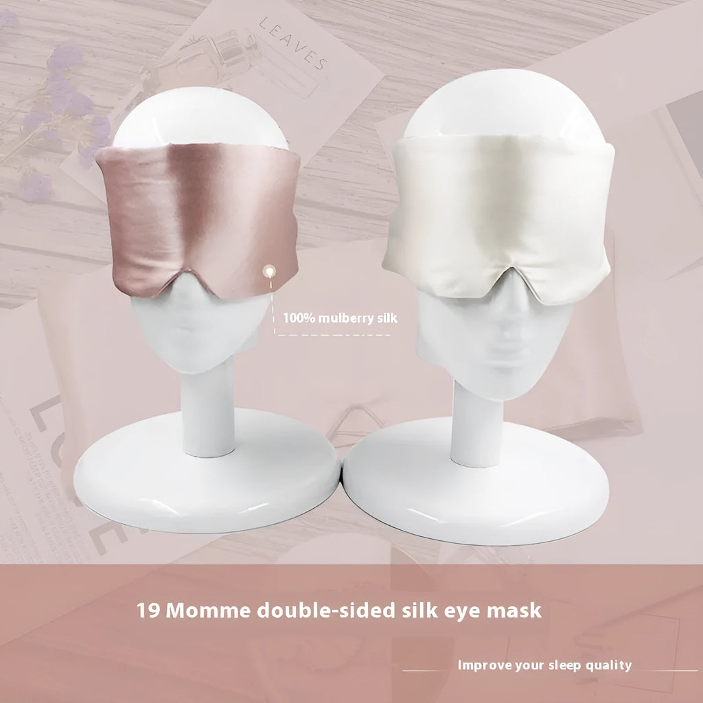 Mulberry silk sleep eye mask shown in champagne gold colour on a neutral background.