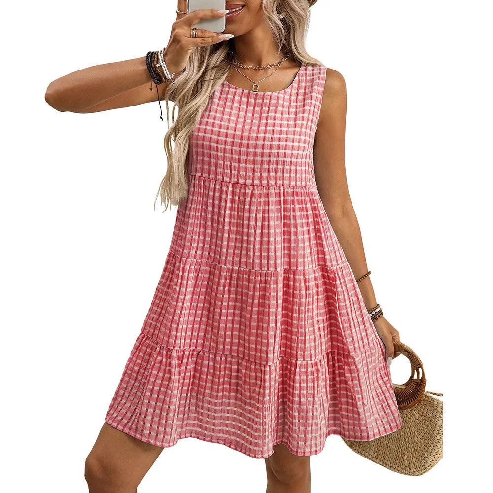 Women's loose-fitting sleeveless plaid dress with a high waist and midi-length swing skirt.