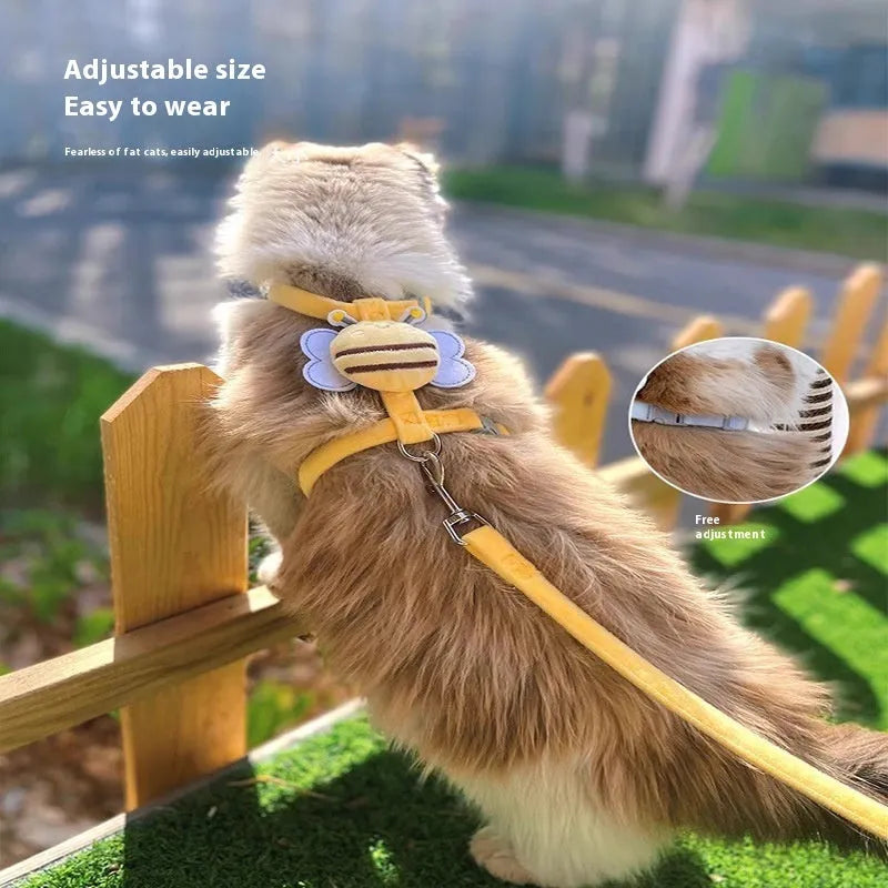 Bee-shaped pink cat collar and lead set for walking, shown with hand-held rope.