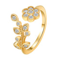 Open mouth copper ring with flower and leaf design in gold finish