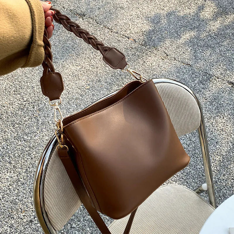 Retro woven PU crossbody bucket bag in khaki colour with adjustable shoulder strap