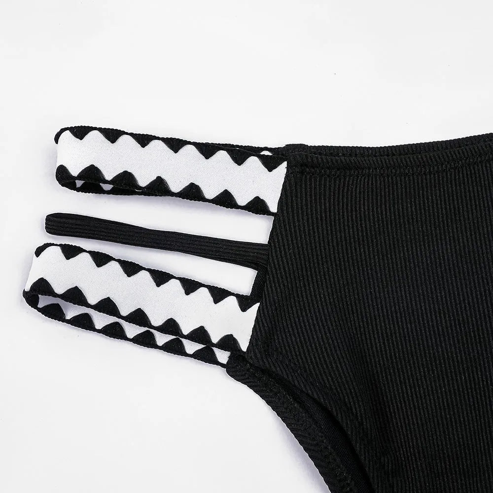 Women's black hollowed-out split swimsuit briefs made of polyester for swimming and wading