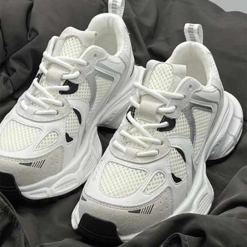 Polar Wave beige mesh platform sports shoes with a wedge heel and lace-up front.