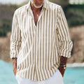 Man wearing a loose 3D printed plaid shirt with a lapel, cardigan style, short sleeves.
