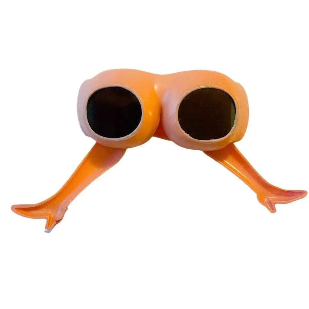Orange plastic novelty sunglasses featuring a leg and hip design theme.