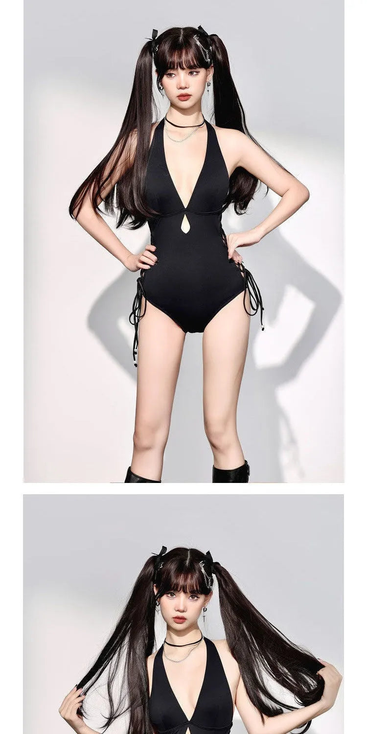 Women's V-neck hollow strap niche one-piece swimsuit in black polyester on a model
