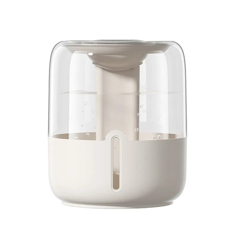 Beige round USB humidifier with dual spray nozzles and a front humidity display panel.