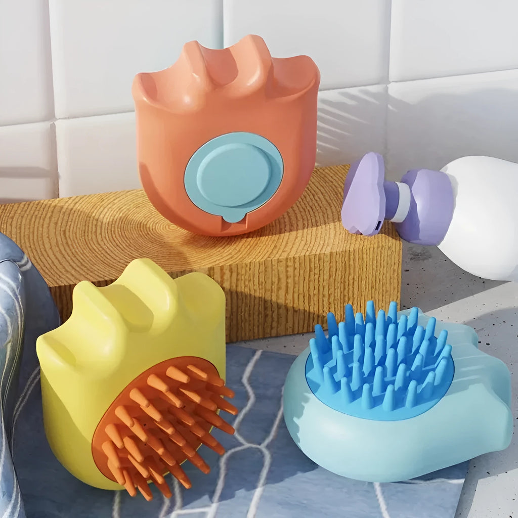 Pet bath brush with built-in shampoo box showing blue, orange and yellow colour options
