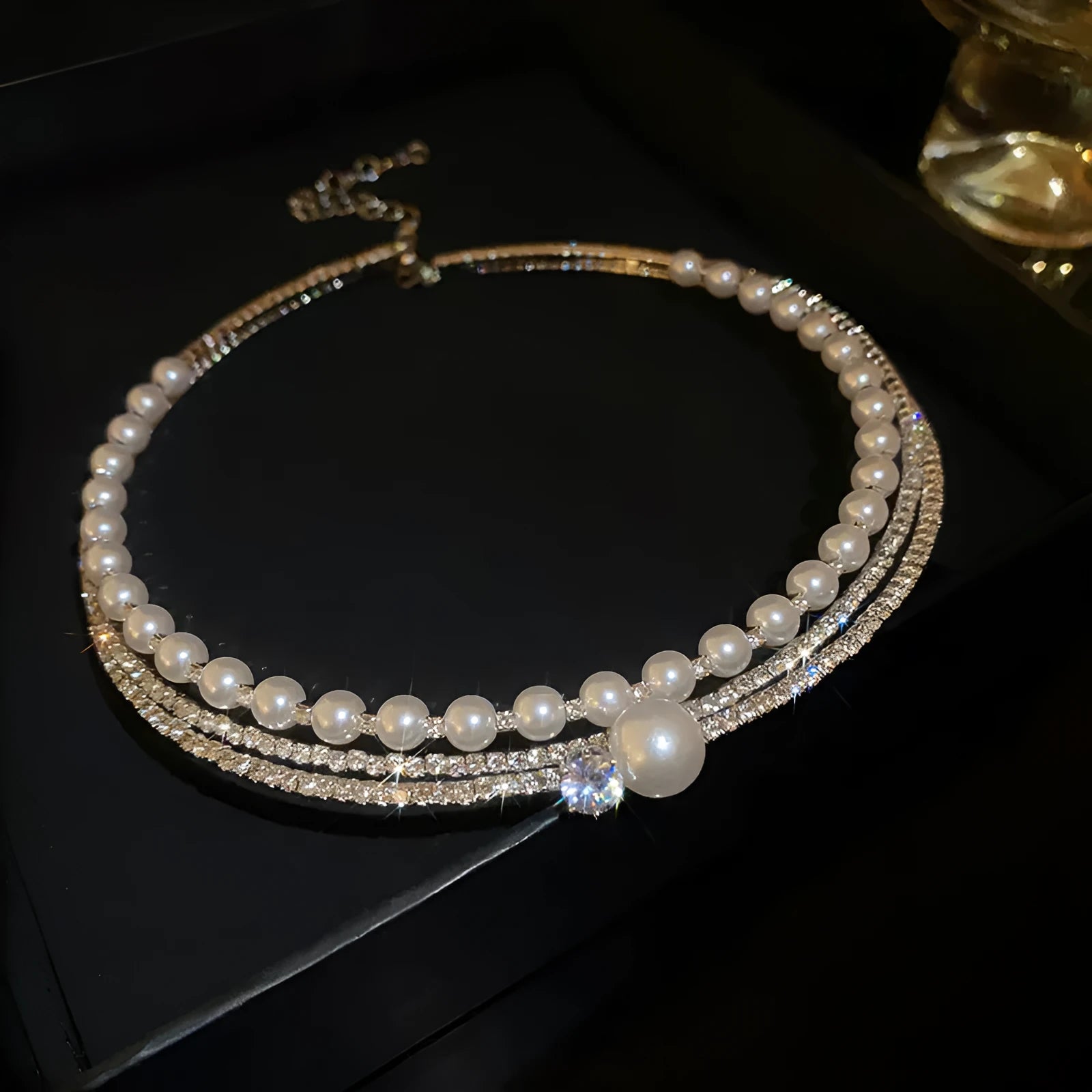 Silver curved round alloy collar necklace for women, designed in a geometry shape to accentuate the collarbone.