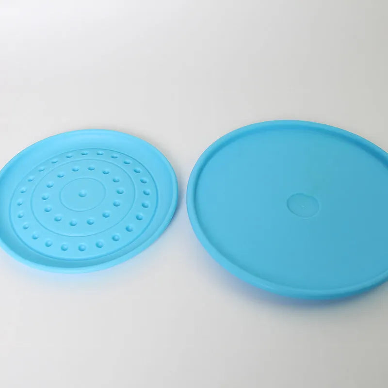 Pet dog toy rubber disk frisbee in plastic, available in small and large sizes with multiple colours
