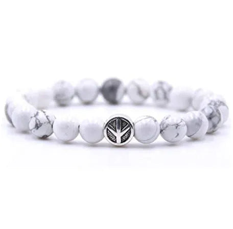 Alloy volcano white turquoise natural stone bracelet with adjustable cord on neutral background