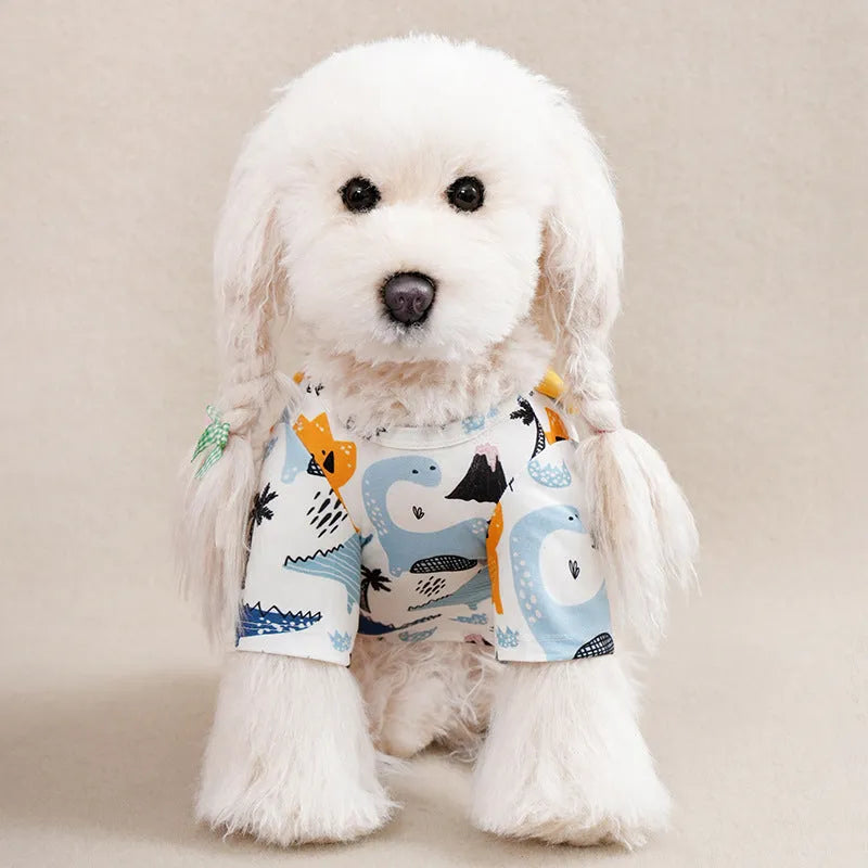 Colourful printed polyester T-shirt for a small dog, showing size chart for S, M, L, XL, and XXL.