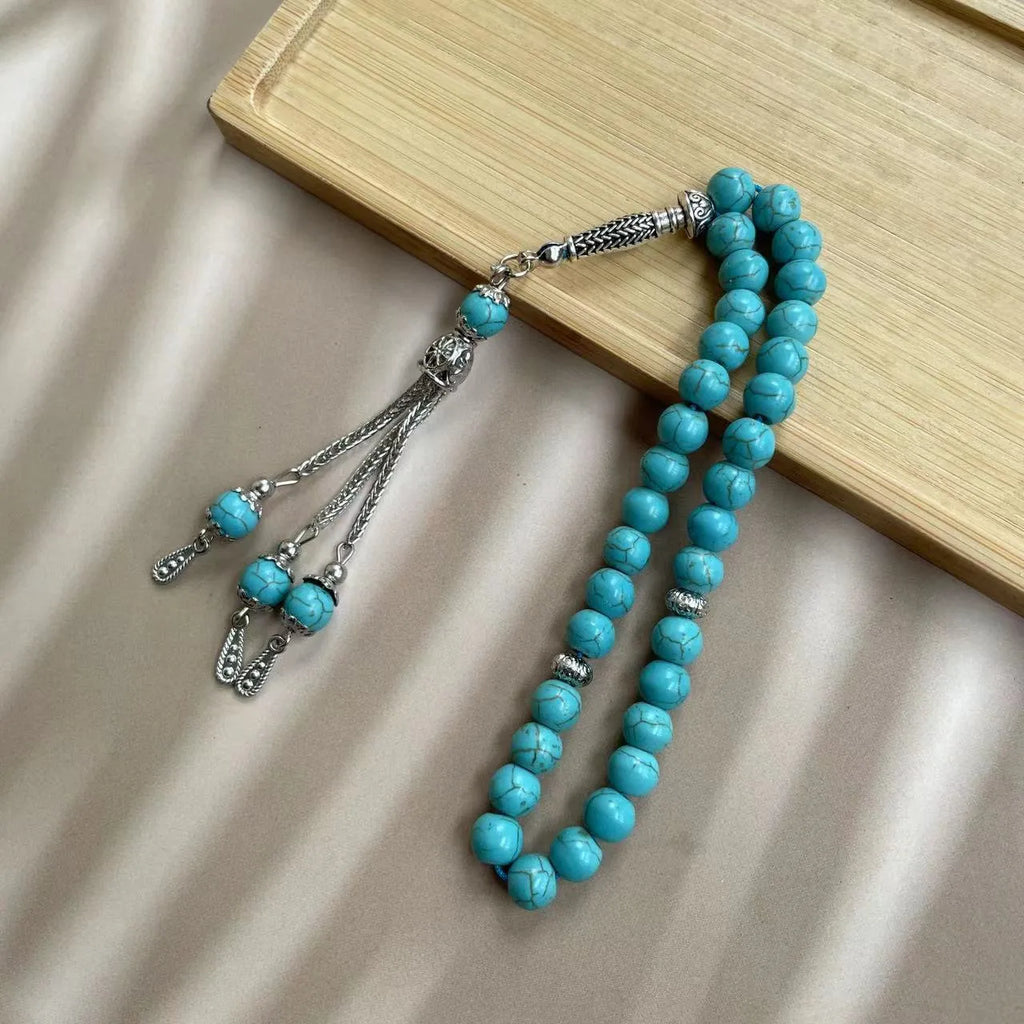 Handmade sky blue stone Muslim prayer bracelet with 8mm beads on a string.