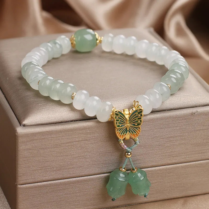 Green crystal Tian Shan Cui abacus beads jade bracelet with retro butterfly tassel and pearl decoration