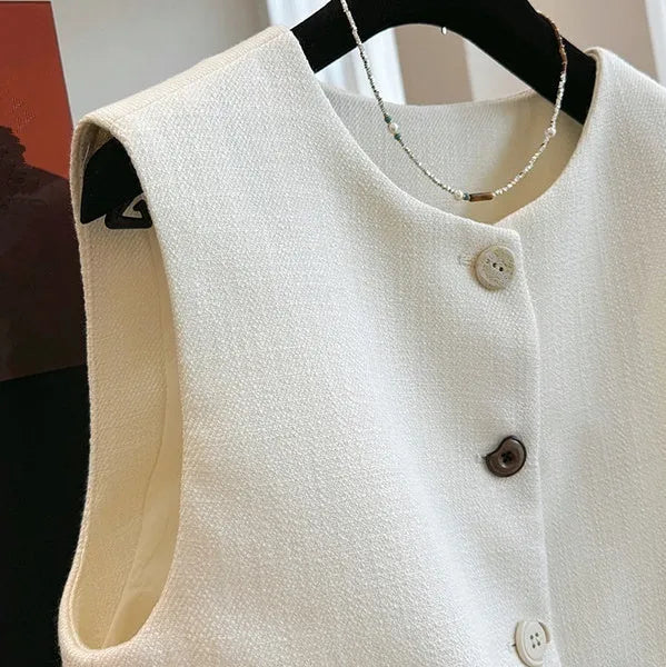 Round neck sleeveless vest with bandage dress styling in milky white colour French style temperament outerwear