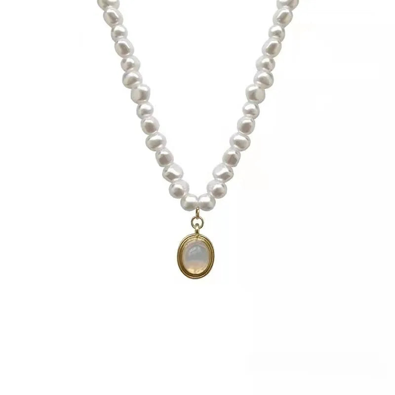 French Court vintage pearl necklace with geometric shapes on electroplated alloy chain showing adjustable length