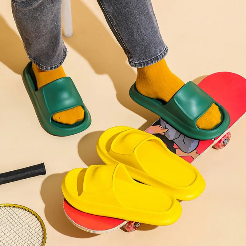 EVA flip-flop slippers with thick non-slip sole in various colours on a white background.