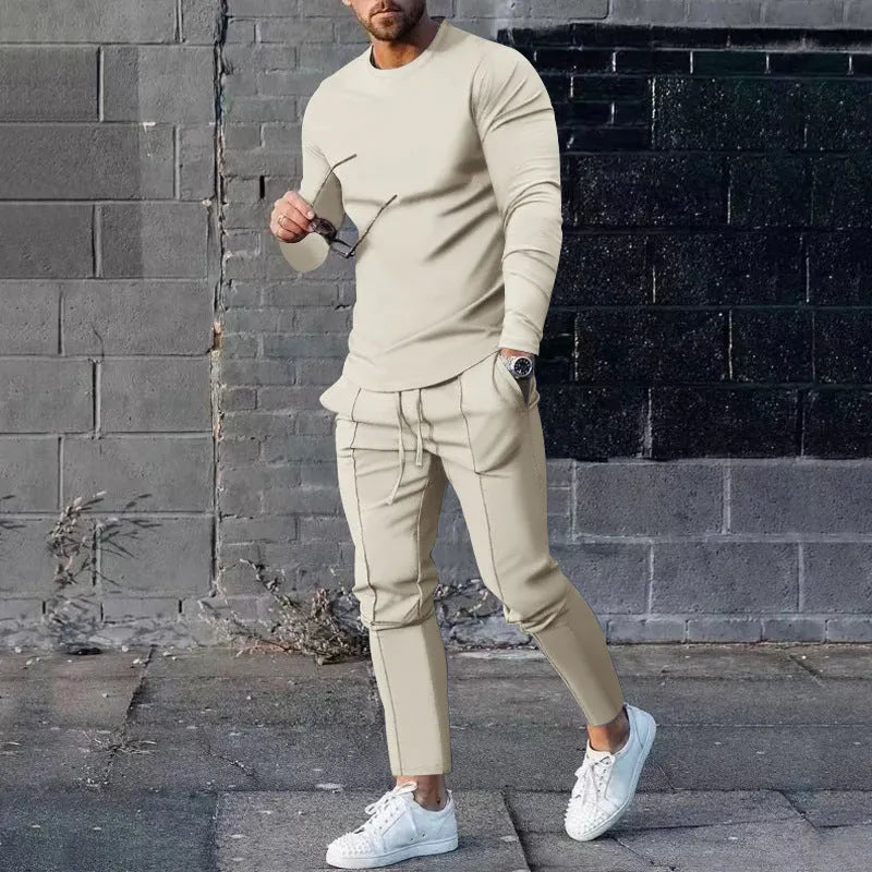 Men's light grey round neck long sleeve T-shirt and matching trousers two-piece polyester suit set.