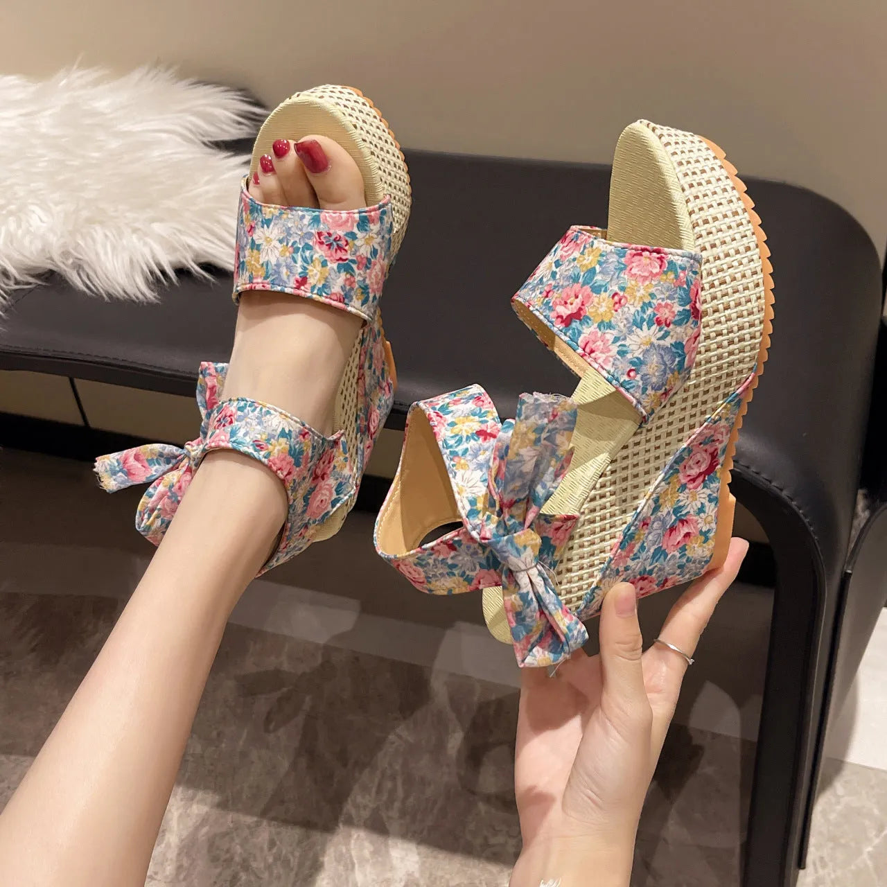 Women's peep toe sandals with cloth upper, ankle-strap buckle, and rubber sole in pink floral colour