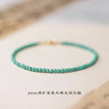 Women's natural turquoise bracelet 2mm beads unisex Chinese style raw ore finish on white background