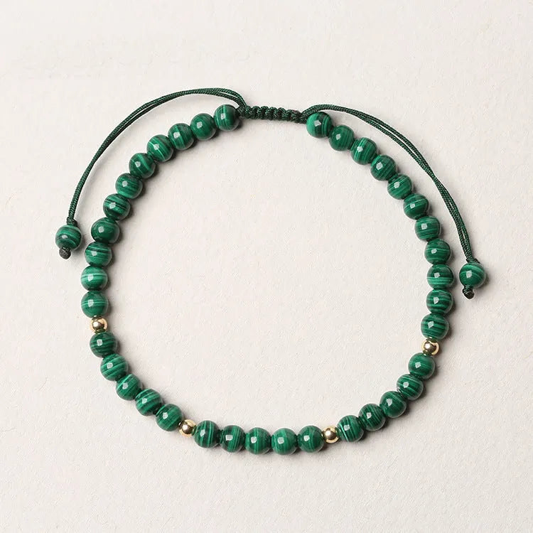 Natural malachite crystal bracelet for women with handwoven golden balls strap and textured green stone