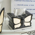 Ceramic light luxury butterfly tissue box and vase set on a living room side table